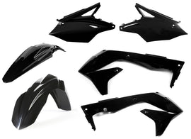Acerbis black plastic kit with various molded plastic parts, suitable for motorcycle or ATV repair and customization.