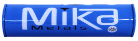 Injection-molded Mika Metals Bar Pad for PW50 in blue, designed as a durable motorcycle accessory for handlebars.