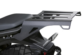 Black National Cycle luggage rack with mounting brackets, designed for motorcycle touring and storage.