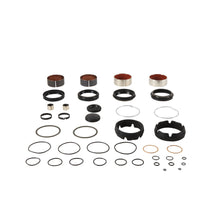 Load image into Gallery viewer, Pivot Works suspension seal and bushing kit for forks, featuring various seals and bushings laid out on a white background.