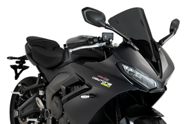 PUIG R-Racer Tri motorcycle windshield with aerodynamic design and clear protective surface for enhanced rider protection.