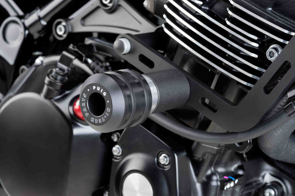 PUIG Vintage Black Frame Sliders for Kawasaki motorcycle, body protection with black finish and mounting hardware visible.