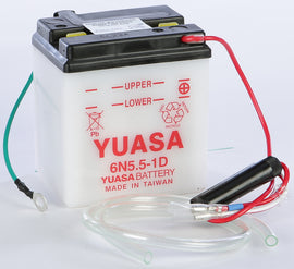 Yuasa 6N5.5-1D conventional motorcycle battery with positive and negative terminals, black casing, and product labels visible.