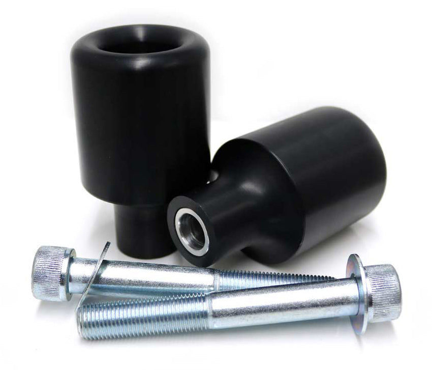 Black Shogun Industries frame sliders mounted on a motorcycle body for protection during rides.