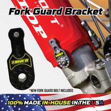 Load image into Gallery viewer, Tamer Tamer Fork Guard Bracket Suspension Single Black 188-8401 installed on motorcycle fork, durable and secure suspension component