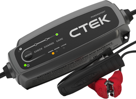 CTEK Power Inc Battery Charger Ct5 Powersport 65-40339 connected to a motorcycle battery, showcasing the charger in use.