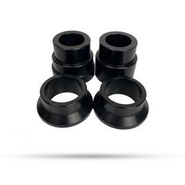 Enduro Engineering Triumph wheel spacers for motorcycle, showcasing metal components with bolt holes for wheel installation.
