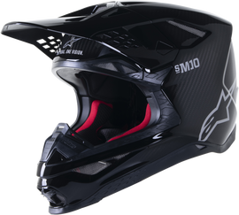Alpine Star Supertech S-M10 solid black glossy and carbon helmet with sleek aerodynamic design and ventilation features.