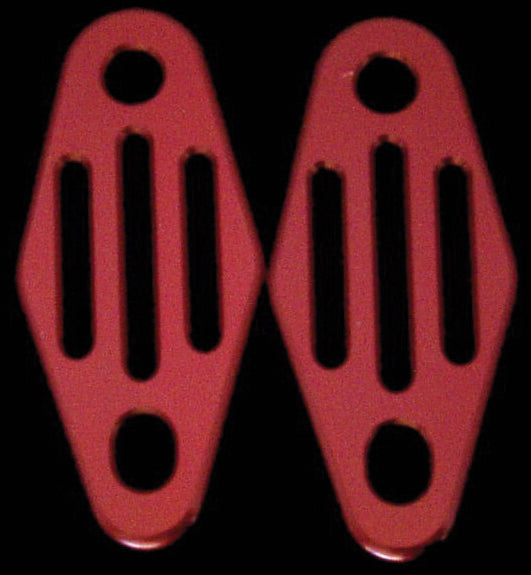 Polished ModQuad exhaust hanger with straight lines, designed for motorcycle exhaust systems, mounted on a body component.