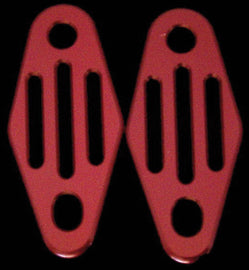 Polished ModQuad exhaust hanger with straight lines, designed for motorcycle exhaust systems, mounted on a body component.