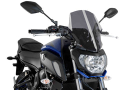 PUIG dark smoke touring windscreen for Naked New Gen Yamaha motorcycle, clear view and aerodynamic design.