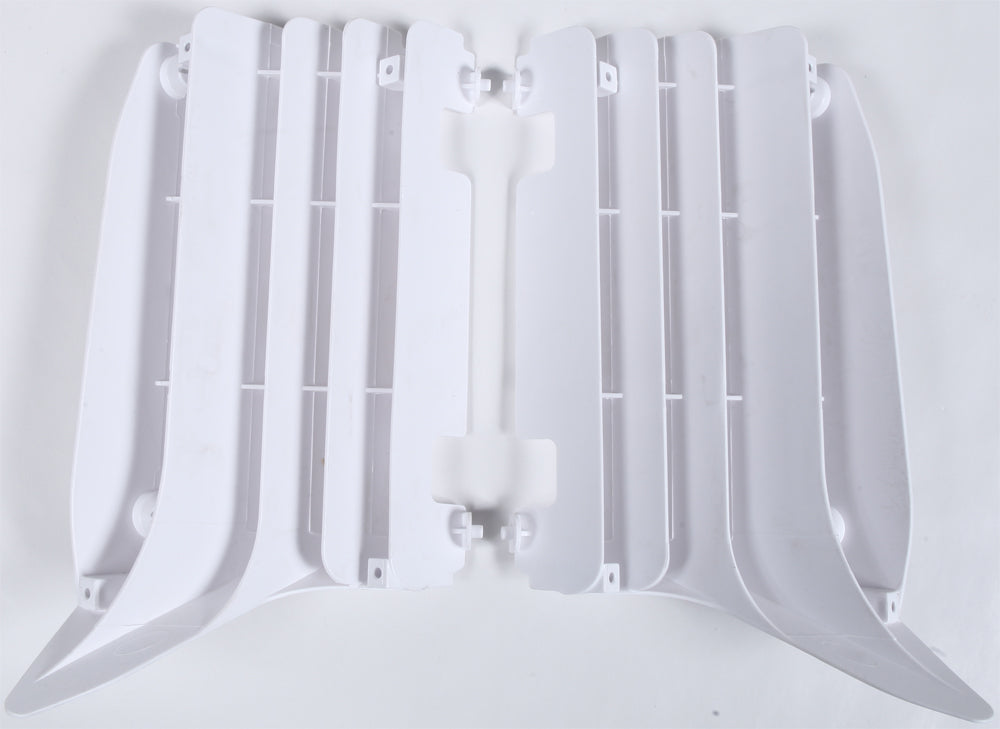 Polisport Plastics white radiator louvers for off-road vehicles, model 64-56501, mounted on a vehicle radiator.