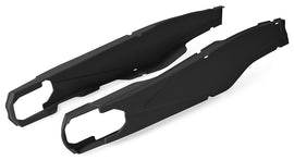 Black Polisport Plastics swingarm protectors for motorcycles, designed to shield the swingarm from dirt and debris.