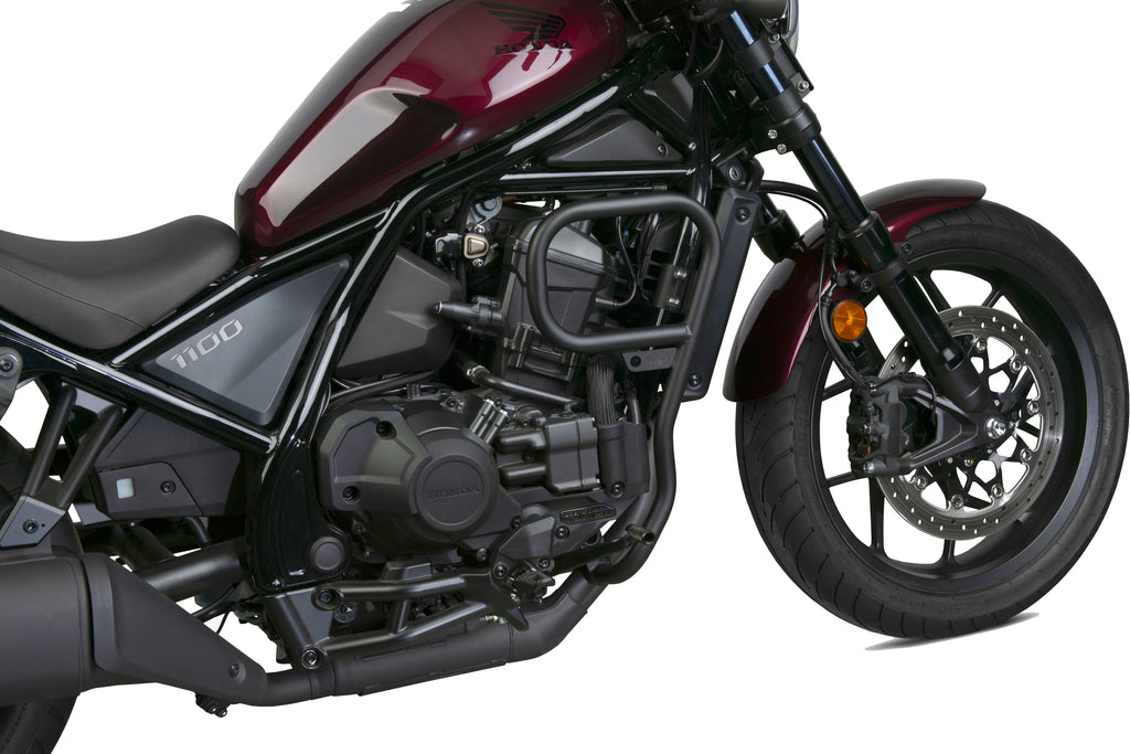 Black National Cycle engine guards with sturdy metal construction and mounting brackets for motorcycle protection.