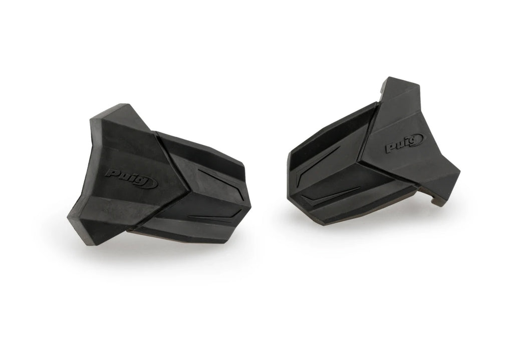 Pair of black PUIG rubber end replacement frame slider guards for R19 motorcycle, shown mounted on bike frame.