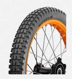Michelin X11 Trial Competition tire with 4.00R18 size, bias ply construction, mounted on a wheel for off-road trials riding.