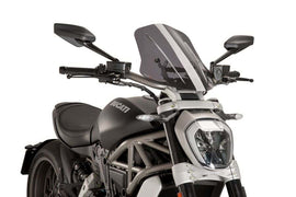 PUIG Naked New Generation Sport Smoke Windscreen for Ducati motorcycle, showcasing the tinted windscreen with mounting edges.