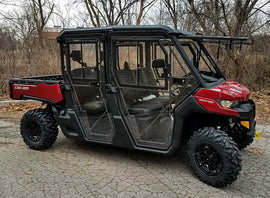 Open Trail full UTV cab with roof and doors, featuring clear windows and sturdy frame for off-road protection.