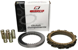 Wiseco steel clutch drive plates for Gas, Husqvarna, and KTM WPPS050 models, showing a set of durable steel plates installed in a clutch assembly.