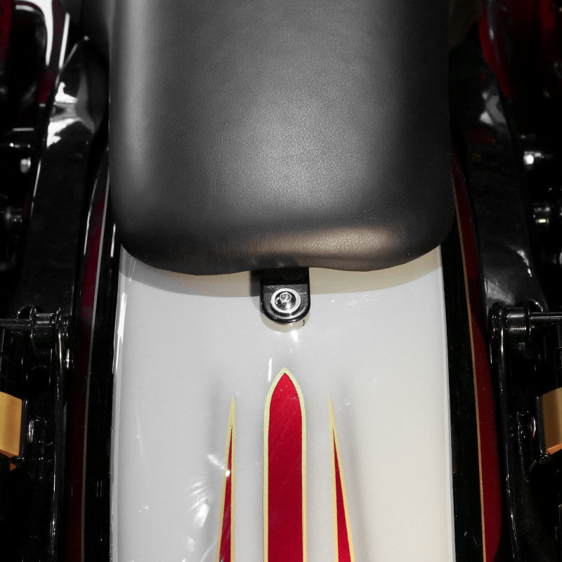BAGGERNATION Seat Doc Seat Anchor System installed in a seat, showing secure mounting and durable construction for motorcycle seating.