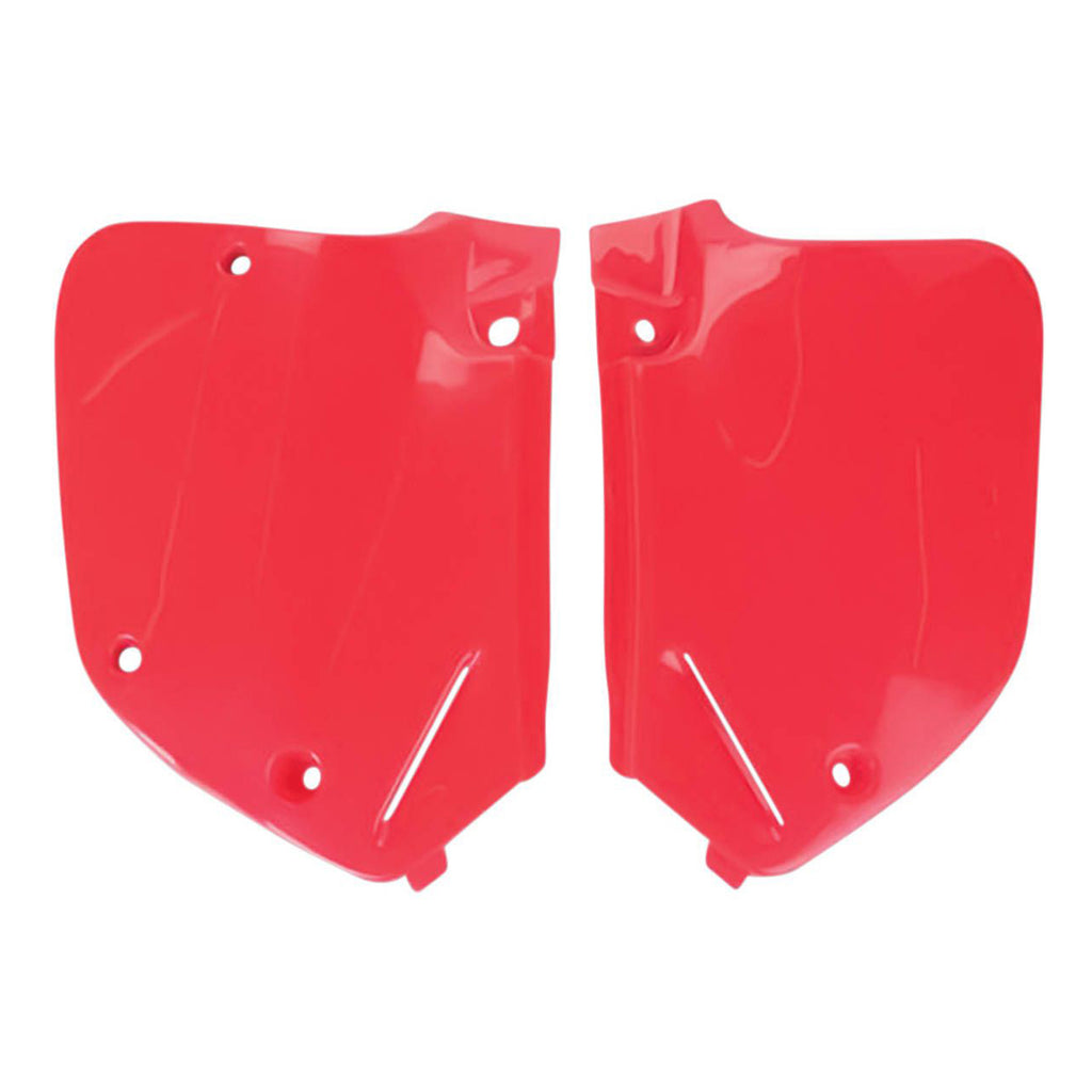 Red Polisport Plastics side panels for CR125/250 dirt bikes, showing the body panels with mounting holes and smooth finish.