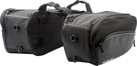 Fly Racing Saddle Bags luggage set with durable black fabric and multiple compartments for motorcycle storage.