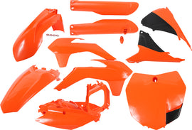 Acerbis full plastic kit in orange and black for motorcycle, featuring various plastic panels and components.