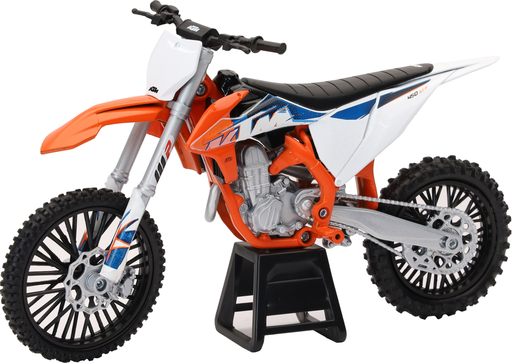 New Ray Toys KTM 450 Sx-F dirt bike 1:12 scale accessories, detailed miniature motorcycle with vibrant orange and black design.