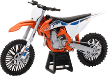 Load image into Gallery viewer, New Ray Toys KTM 450 Sx-F dirt bike 1:12 scale accessories, detailed miniature motorcycle with vibrant orange and black design.