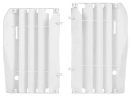 Polisport Plastics white radiator louvers for Honda CRF250 motorcycle, visible with vented design and mounting points.
