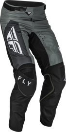 Fly Racing Kinetic Jet Pants in grey, dark grey, and black, size 40, shown on a rider with protective gear.