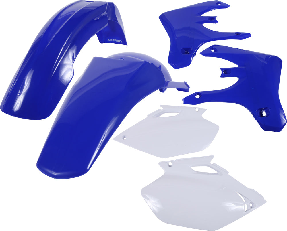 Acerbis blue plastic kit for motorcycle, includes various panels and parts, laid out on a flat surface.