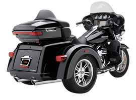 Black Cobra 909-Twins 4-inch slip-on exhaust system with tri-glide design for Harley Davidson motorcycles.