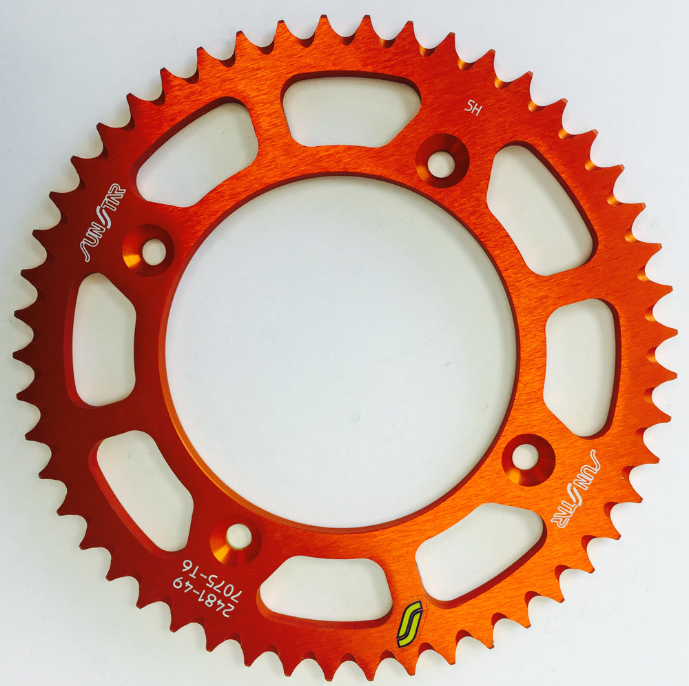 Sunstar aluminum rear sprocket with 49-tooth for Husqvarna and KTM motorcycles, featuring 428 chain compatibility.