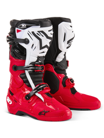 Alpine Star Tech 10 Enduro Boots in bright red, black, and white, showing sturdy design and secure ankle support.