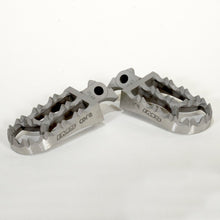 Load image into Gallery viewer, IMS Core Enduro Yamaha footpegs, durable motorcycle foot controls with textured surfaces for grip and stability.