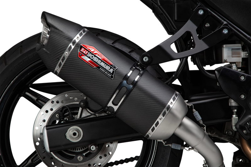 Yoshimura Exhaust Street AT2 stainless steel muffler with carbon fiber end cap, designed for motorcycle performance and style.