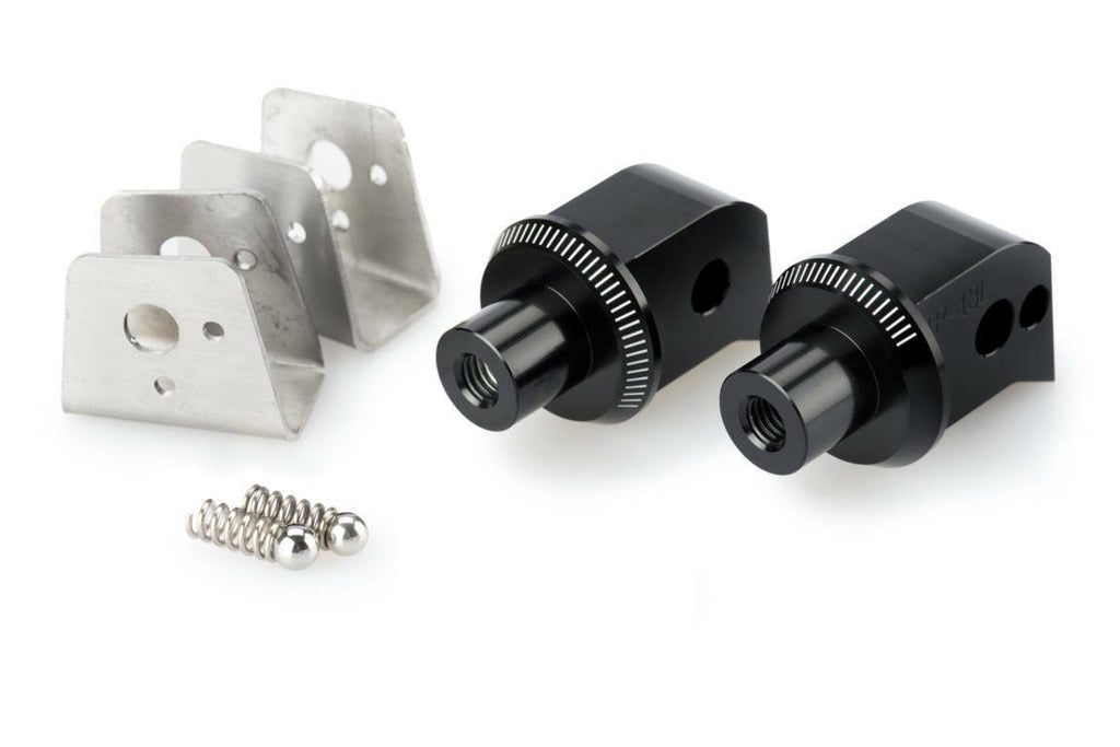 PUIG Footpeg Adapter 561-08798BK for motorcycle foot controls, shown attached to black footpeg with mounting hardware.