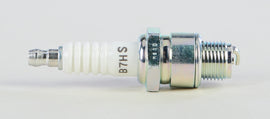 NGK Spark Plug #5110/04 2-B7HS showing the metal electrode and ceramic insulator for automotive ignition system.
