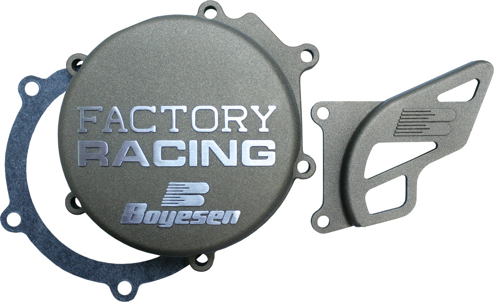 Boyesen Factory Racing Magnesium Ignition Cover showing the sleek silver magnesium finish and detailed branding.