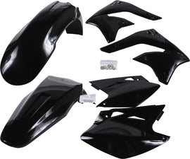 Acerbis black plastic kit with various custom-fit motorcycle parts, including panels and covers, arranged on a surface.