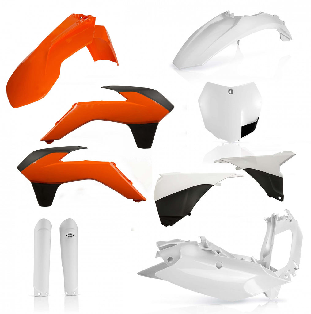 Acerbis full plastic kit in black for motorcycle, showing various plastic body panels and parts laid out on a surface.