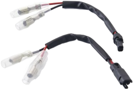 Pair of RIZOMA electrical turn signal cable kits with black connectors and wiring for motorcycle turn signal installation.