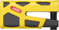 Yellow Abus Granit Sledg 77 disc lock with key, heavy-duty security lock for bicycles and motorcycles.