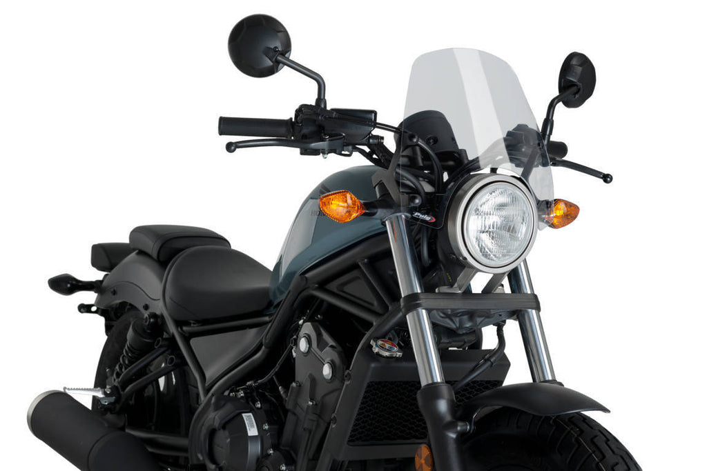 Clear PUIG Windscreen for Naked New Gen Sport motorcycle, showcasing the aerodynamic design and mounting points.