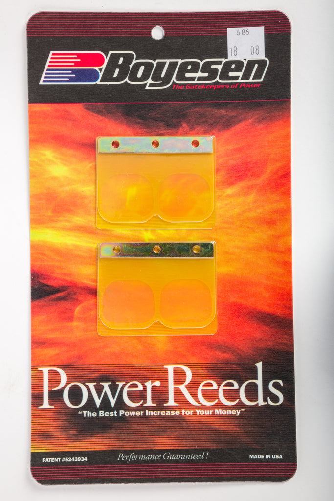 Boyesen motorcycle reeds 59-7686 for intake and carburetor fuel system, shown installed on a motorcycle engine component.
