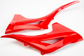 Polisport Plastics radiator scoops in red for gas-powered bikes, designed to enhance cooling and airflow.