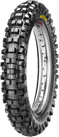 Maxxis Mc Desert It Rear tire 110/100-18 bias tire with tread pattern for off-road desert riding, shown from side view.
