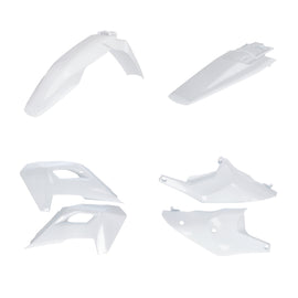 Acerbis white plastic body kit for Hus motorcycle, including various body panels and parts arranged on a flat surface.