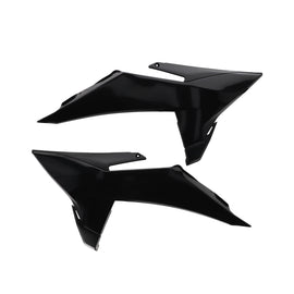 Acerbis black radiator shroud for KTM motorcycles, body part with vent openings, designed for durability and fitment.